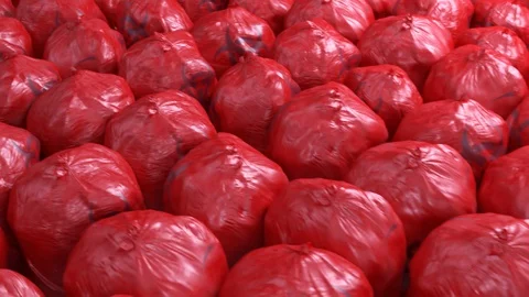 Seamless looping animation of biohazard trash in bright red plastic bags Stock Footage 112597597