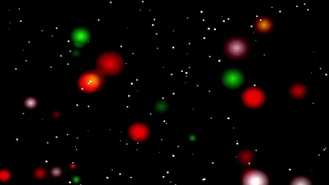 Seamless Looping Festive Red and Green Glowing Bokeh and Particle Video Bac.. Stock Footage 344710159