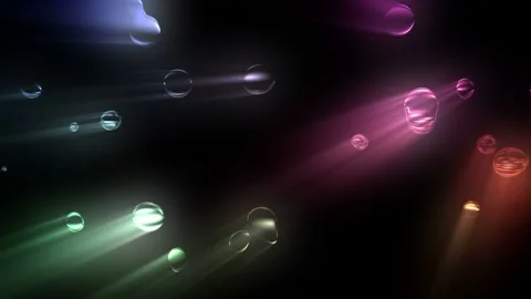 Seamless looping motion background shows glowing colorful bubbles and light Stock Footage 160609047