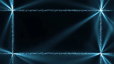 Seamless looping motion background shows glowing light rays in a particles frame Stock Footage 160667779