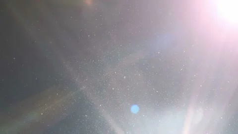 Seamless looping motion background shows glowing light rays and particles Stock Footage 160670215