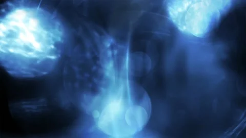 Seamless looping motion background shows a dark blue design and glowing bokeh Stock Footage 160670864