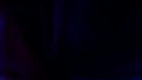 Seamless looping motion graphic shows colorful light flashes that can be used as Stock Footage 160664427