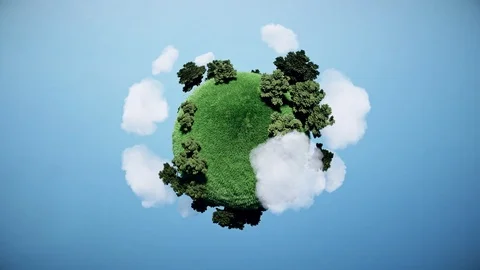 Seamless looping small planet with grass and trees in blue sky and clouds. Stock Footage 120021663