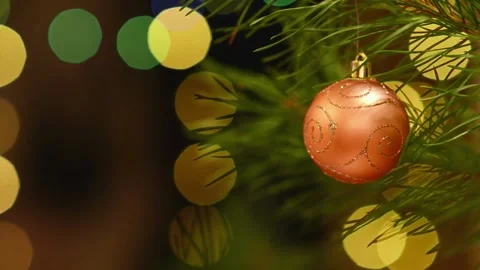 Seamless Looping Video with Bronze Christmas Ornament and Bokeh Stock-Footage 344581526