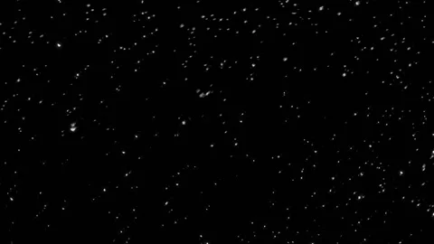 Seamless looping video clip features white falling snow on black background Stock Footage 160599987