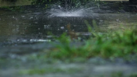 Seamless Looping. Water Flowing Hard From The Rain Falls On The Asphalt Road Video stock 107263207