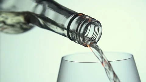 Seamless looping white wine (alcohol) pour from bottle white isolated background Stock Footage 138570340