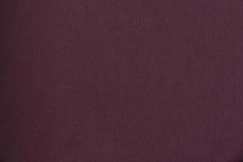 Seamless maroon knit fabric. Solid background Stock Photos