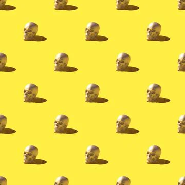 Seamless pattern of 3D render skulls over bright yellow background Stock Illustration