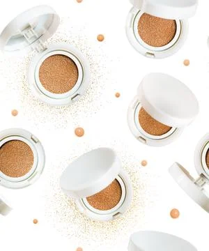 Seamless pattern of 5 Foundation cushion powder with various open lids. Cosmetic Stock Photos