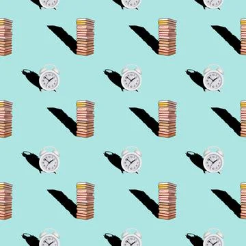 Seamless pattern of alarm clock and books on a blue background. Stock Photos