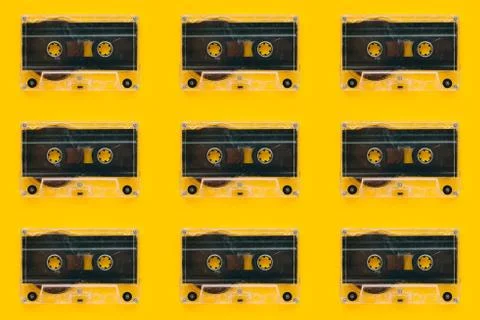 Seamless pattern background of audio cassettes Stock Photos