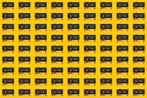Seamless pattern background of audio cassettes Stock Photos