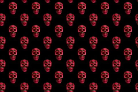 Seamless pattern from black skull with flowers on black background. Stock Photos
