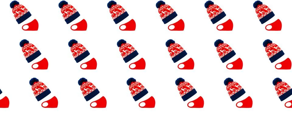 Seamless pattern. Blue-red winter bobble hat, ski or knit hat with deer and red Stock-Illustration