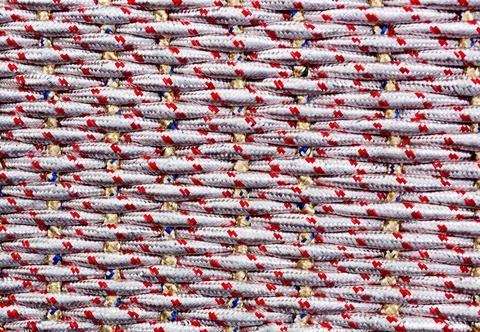 Seamless pattern of braids, endless texture. Knitting line pattern. Stock Photos