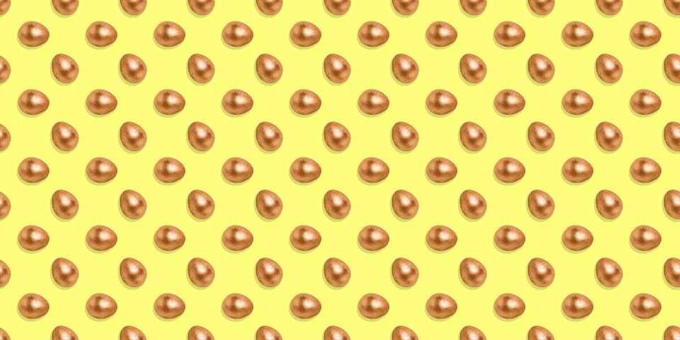 Seamless pattern with bronze eggs on a yellow background. Stock Illustration