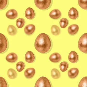 Seamless pattern with bronze eggs on a yellow background. 写真素材