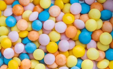 Seamless pattern with candy. Colorful candy background. Many sweet candies... Stock Photos
