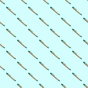 Seamless pattern of causal ballpoint pens on a blue background. Stock Photos