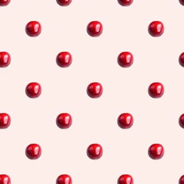 Seamless pattern with cherries on a light pink background. Minimal isometric  Stockfoto's
