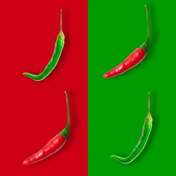 Seamless pattern of chilli peppers isolated on red and green backgrounds Stock Photos