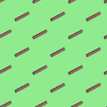 Seamless pattern with chocolates on a green background. Minimal isometric tex Stock Photos