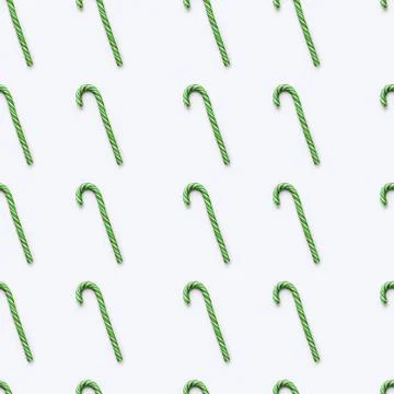Seamless pattern of Christmas candy cone on white background. Colorful holida Stock Photos