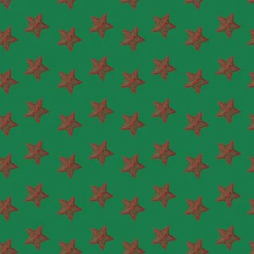 A seamless pattern, Christmas red starlets on a green background. Stock Photos