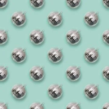 Seamless pattern of Christmas silver disco ball. Xmas background. Stock Photos