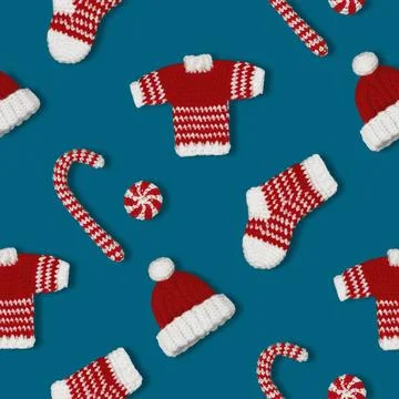 Seamless pattern decorative knitted ornaments sock, sweater, hat and carame.. Stock Photos