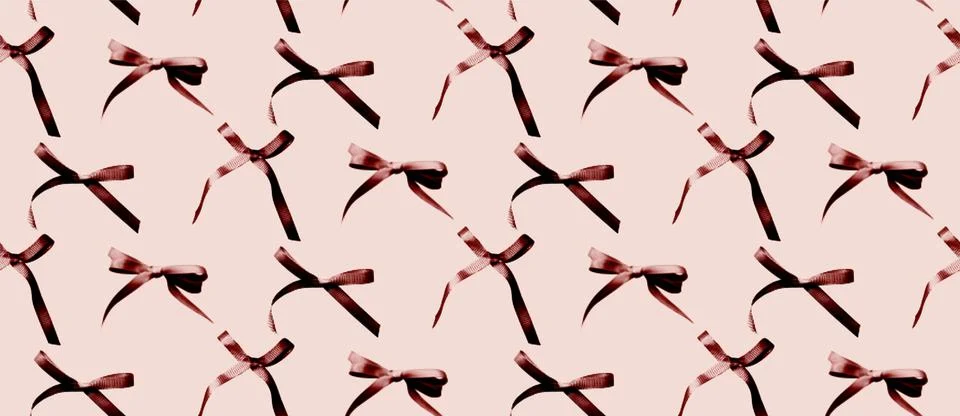 Seamless pattern with delicate ribbon bows in a retro-inspired red hue 스톡 일러스트