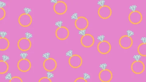Seamless Pattern of Diamond Engagement Rings on Pink Background for Wedding Stock Footage 345539985