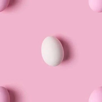 Seamless pattern of Easter eggs over pink background, top view Stock Photos