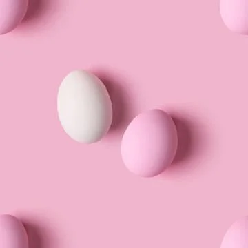 Seamless pattern of Easter eggs over pink background, top view 스톡 사진