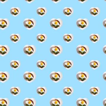 A seamless pattern of egg on a blue background Foto stock