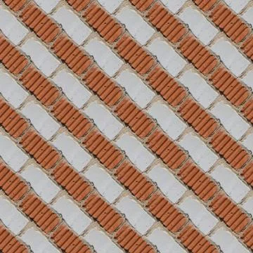 Seamless pattern of fragment of red and white stone wall Stock Photos