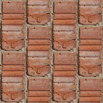 Seamless pattern of fragment of red stone wall Stock Photos