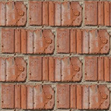 Seamless pattern of fragment of red stone wall Stock Photos
