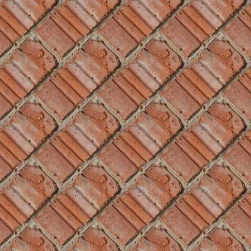 Seamless pattern of fragment of red stone wall Stock Photos