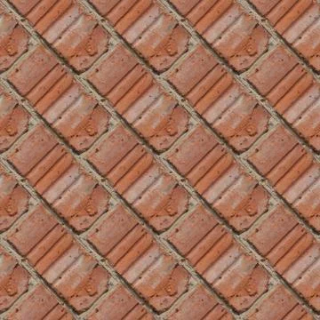 Seamless pattern of fragment of red stone wall Stock Photos