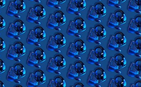 Seamless pattern with games keyboard, mouse and headset on blue background. 스톡 사진