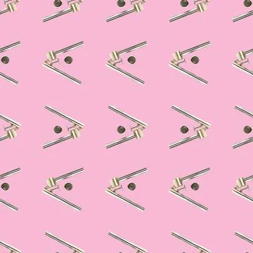 Seamless pattern from garlic press isolated on pink flat lay Foto stock