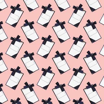 Seamless pattern with gift box on a pink background. Stock Illustration