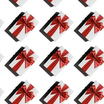 Seamless pattern with gift box with red ribbon on white from above Stock Photos