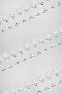 Seamless pattern - glasses over white background Stock Photos