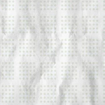 A seamless pattern of green identical square dot groups on a white crumpled p 스톡 사진