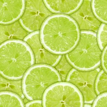 Seamless pattern of green lime slices Stock Photos