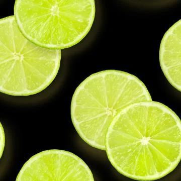 A seamless pattern of green lime slices on a black background, a vibrant fruity 스톡 사진
